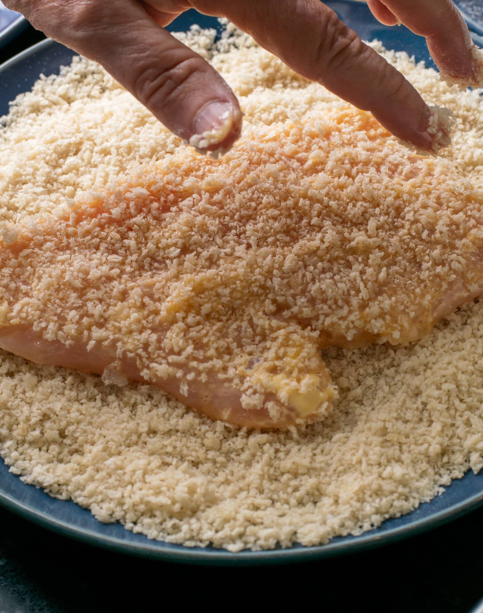 chicken dredged in breadcrumbs