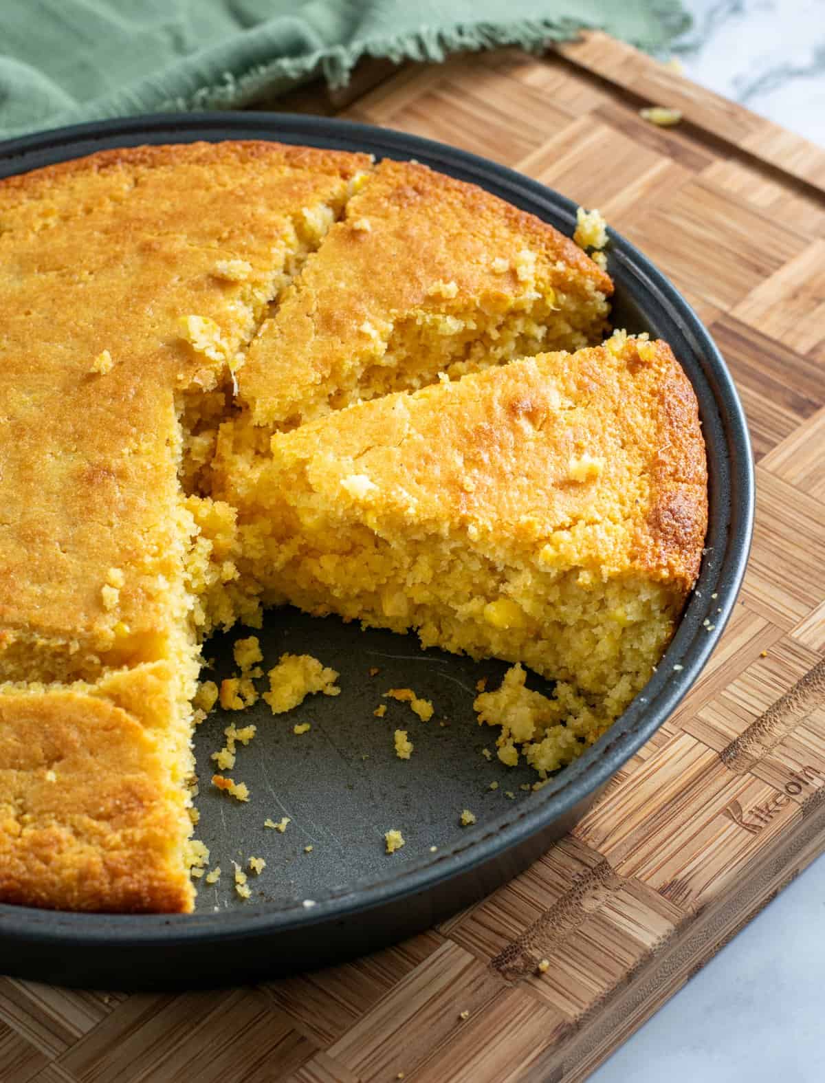 moist gold sweet cornbread piece in a pan