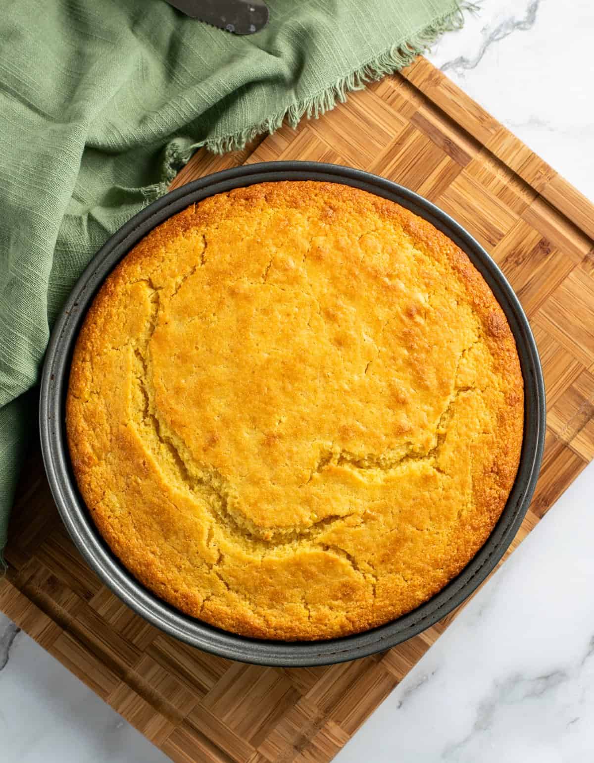 cake pan of cornbread on a cooling board
