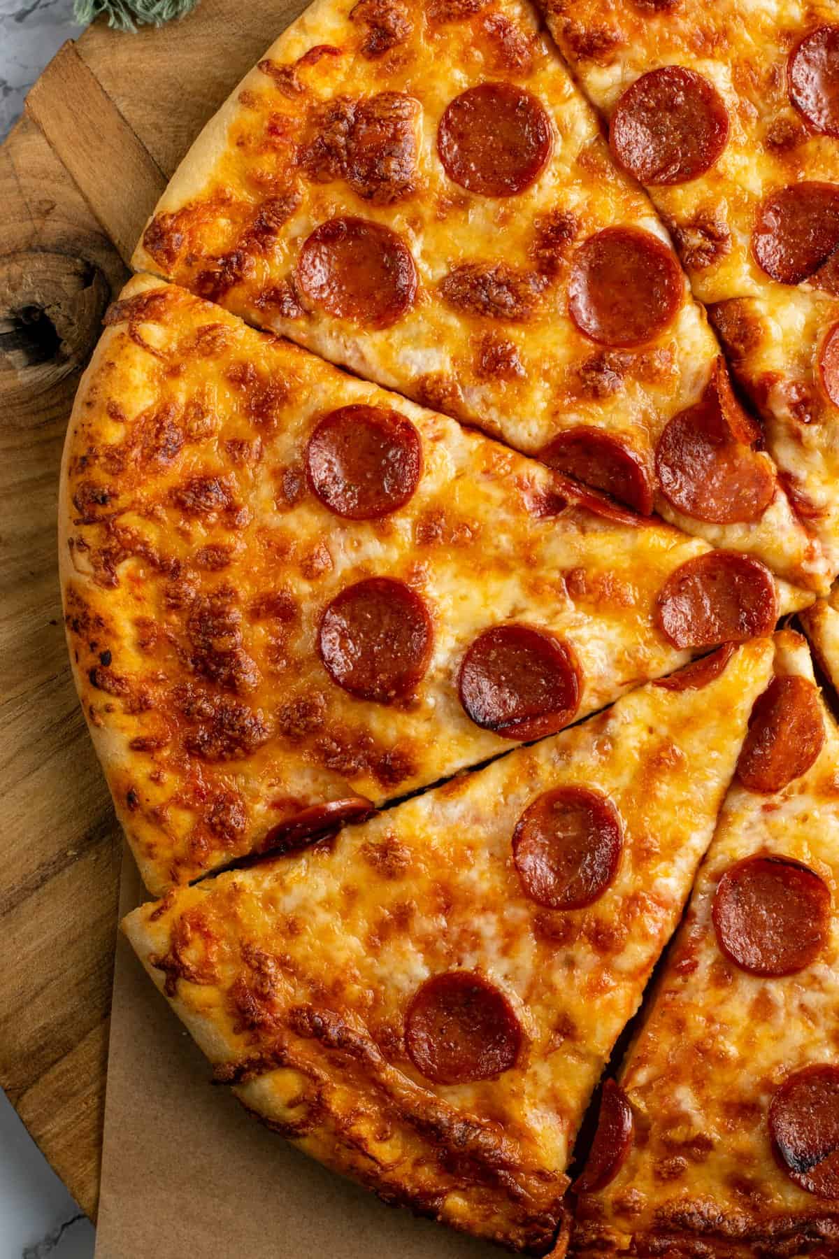 golden pepperoni pizza slice